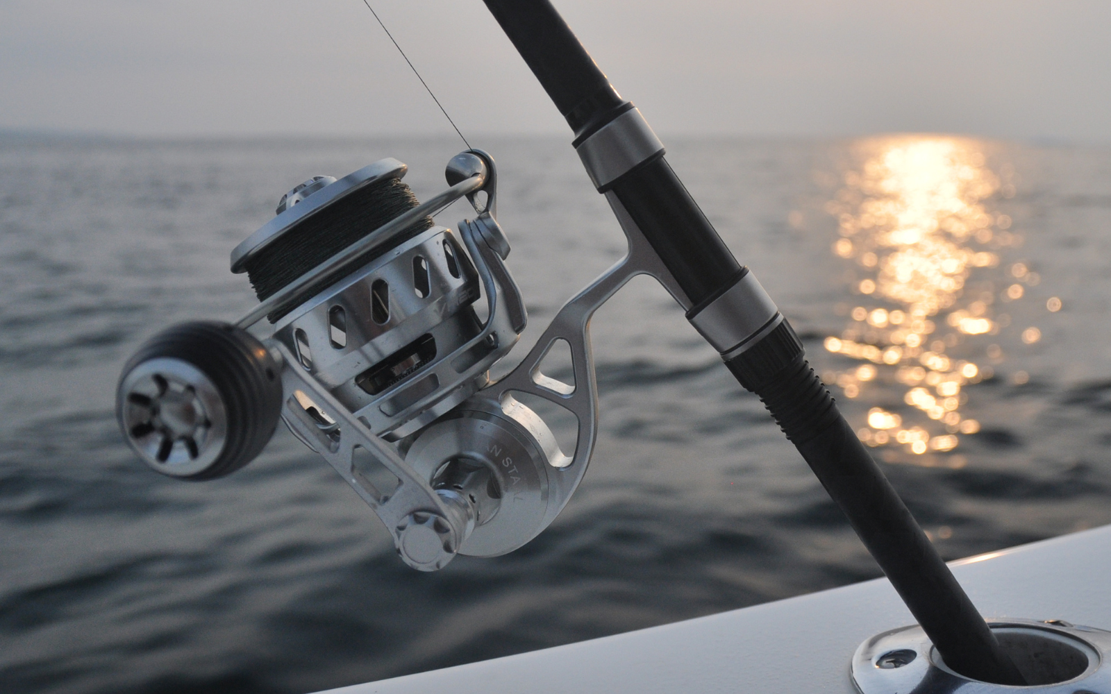 closeup of van staal reel on the water